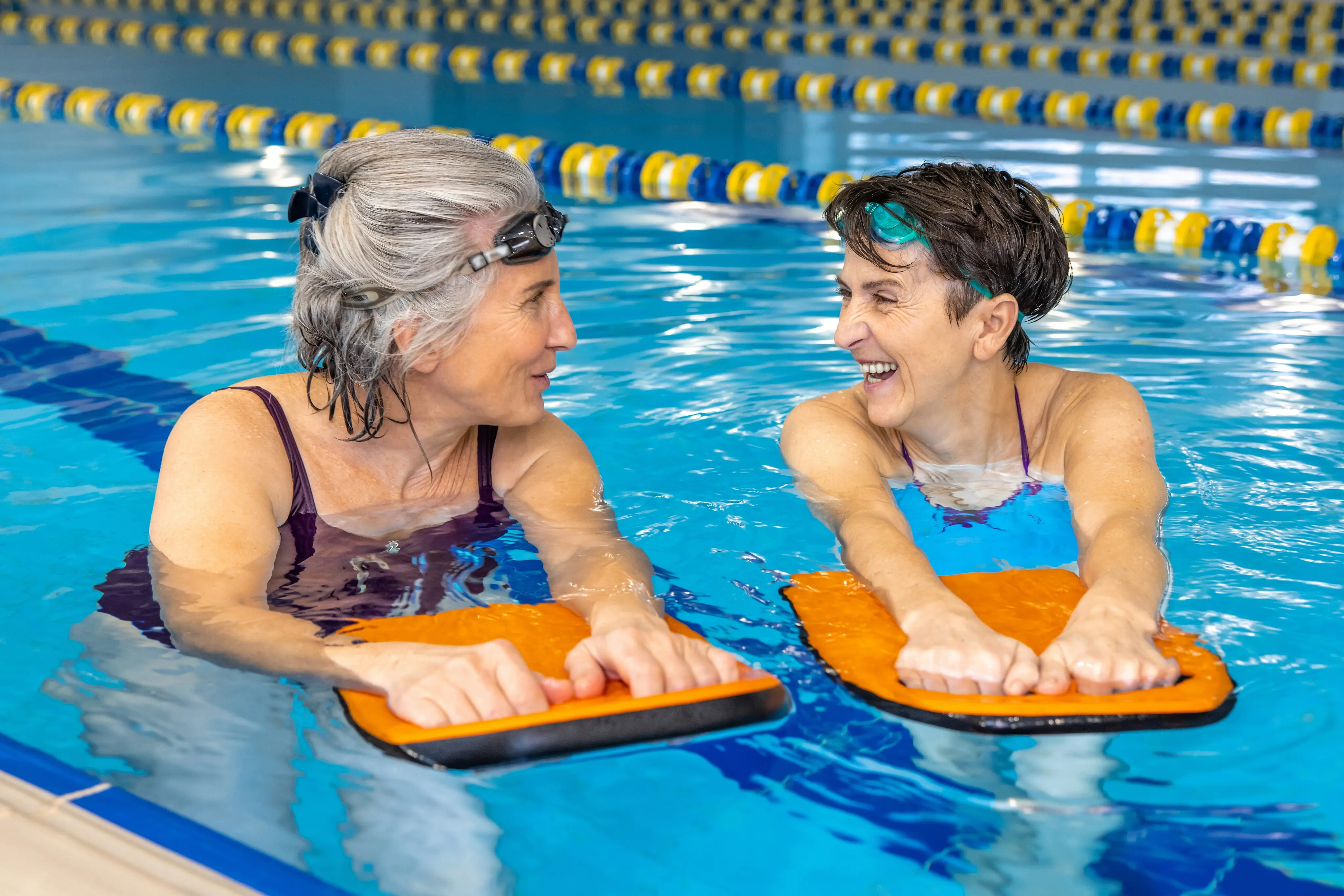 Two adult swimmers training together